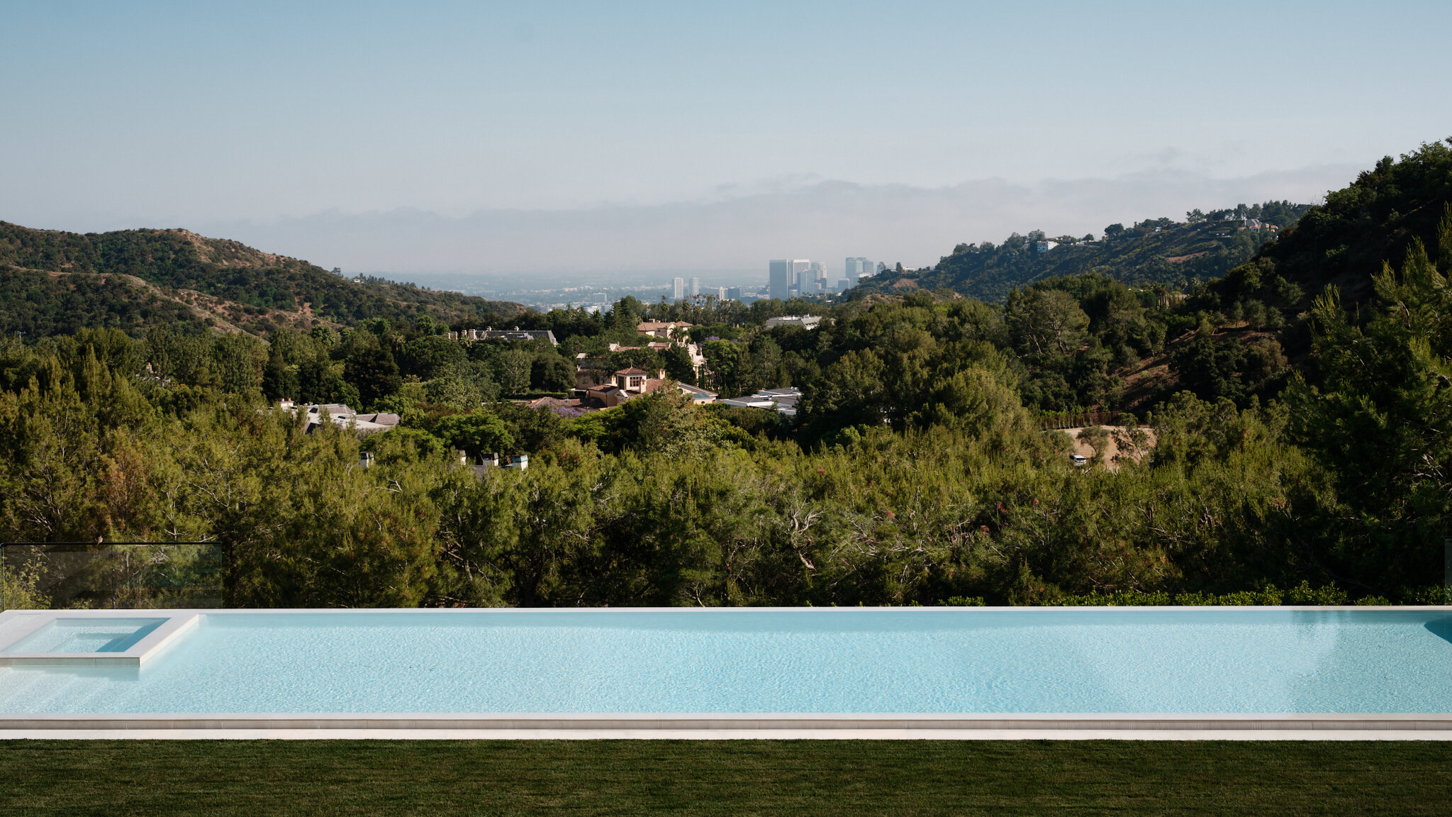 Infinity pool overlooking the canyon toward the Los Angeles skyline