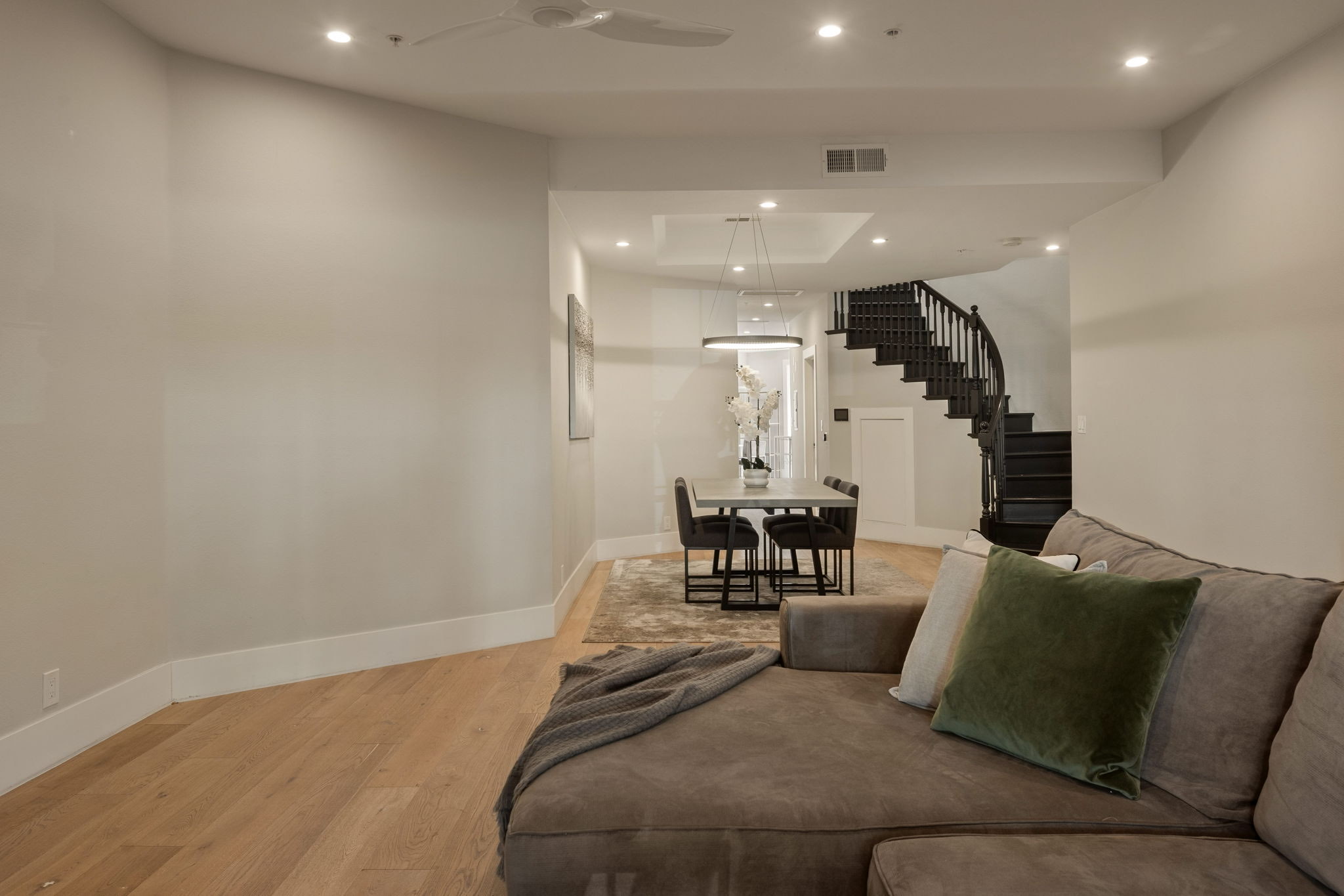 241 S Lasky Drive &mdash; living room looking through to the dining area and staircase