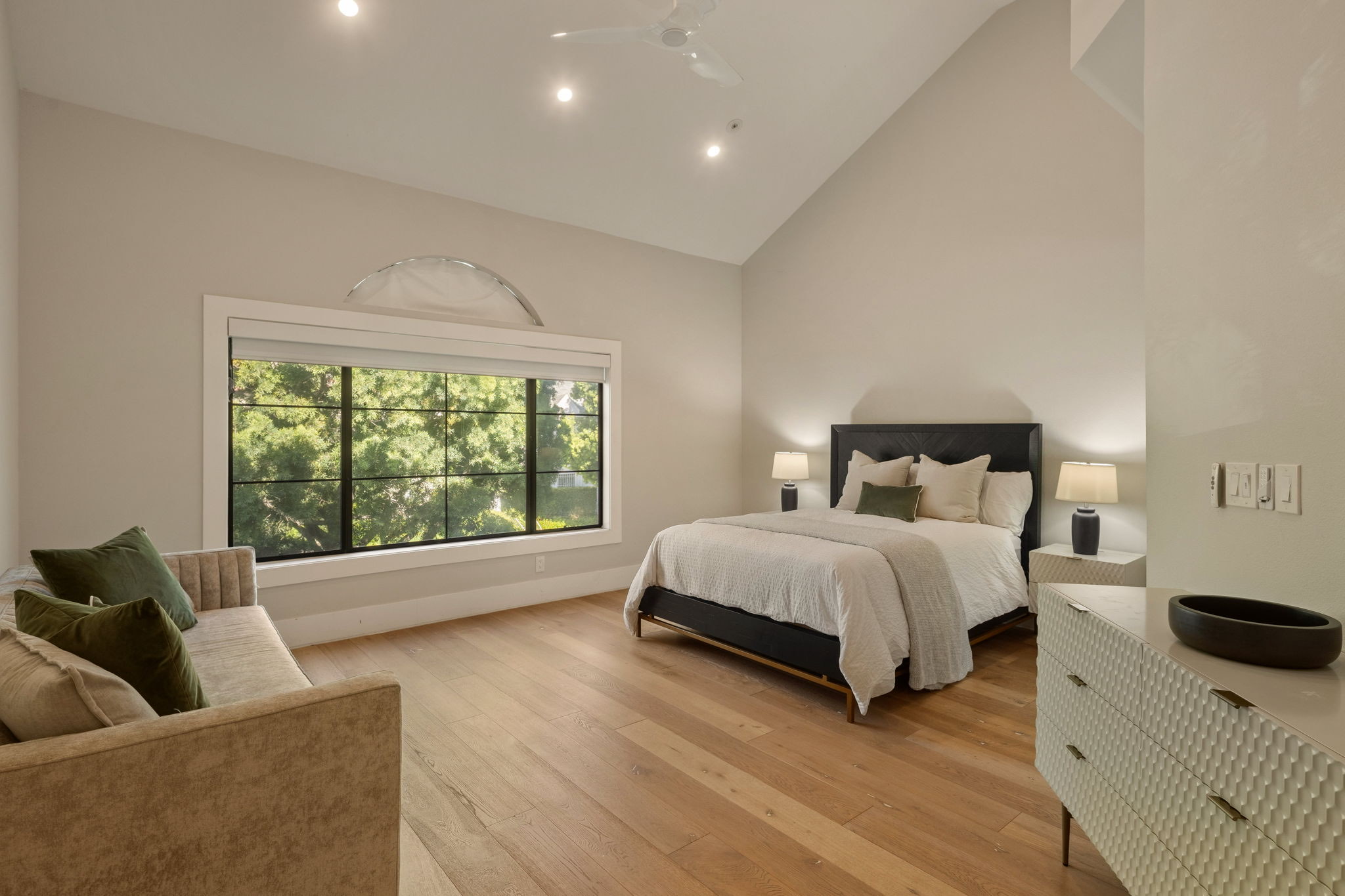 241 S Lasky Drive &mdash; primary bedroom with vaulted ceiling