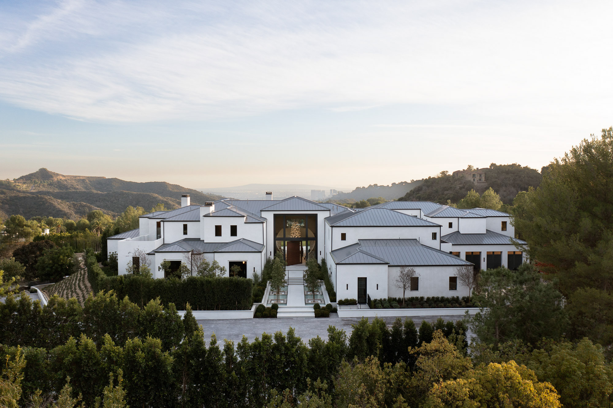 73 Beverly Park — aerial view of the front elevation, with the Santa Monica Mountains beyond